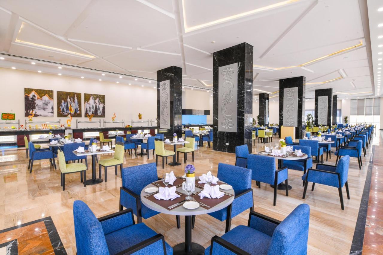 Tolip Gardens Hotel Le Caire Extérieur photo The restaurant