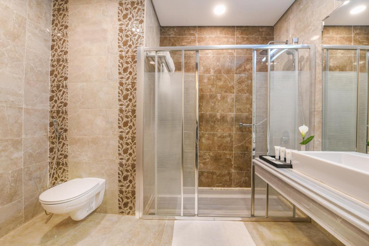 Tolip Gardens Hotel Le Caire Extérieur photo A shower enclosure