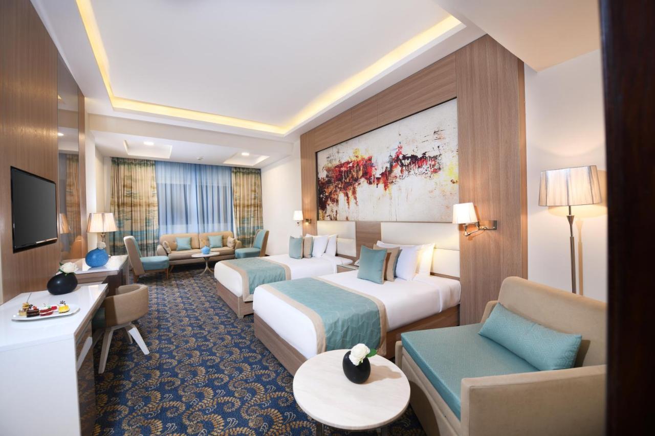 Tolip Gardens Hotel Le Caire Extérieur photo Family room