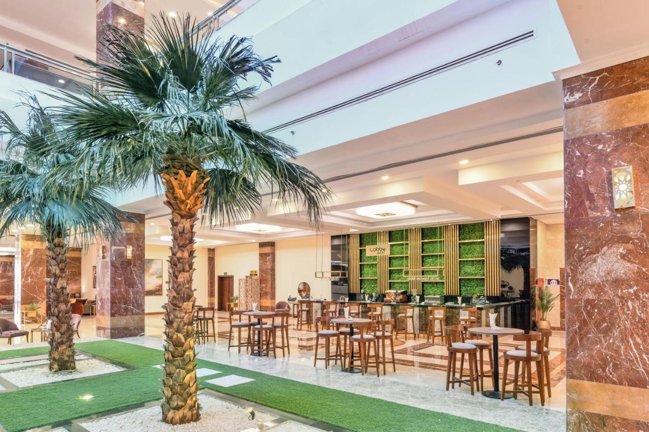 Tolip Gardens Hotel Le Caire Extérieur photo Lobby