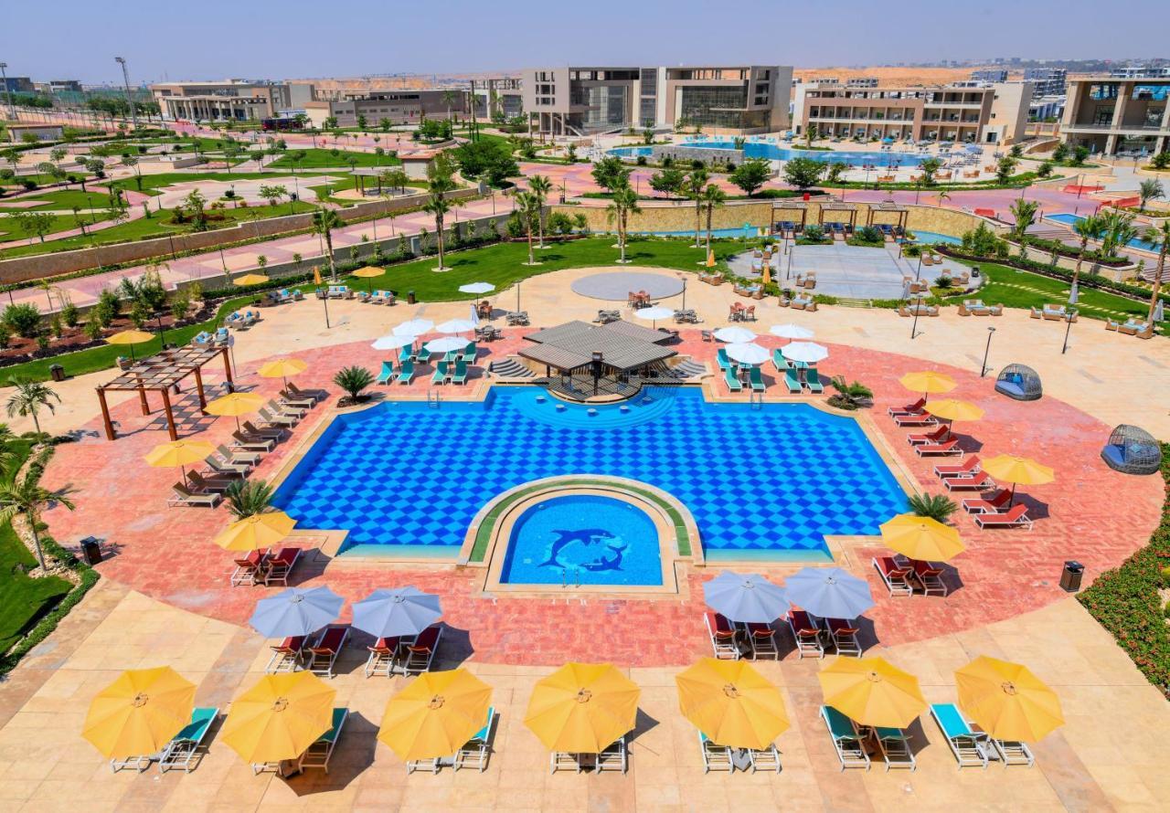 Tolip Gardens Hotel Le Caire Extérieur photo The swimming pool at the resort