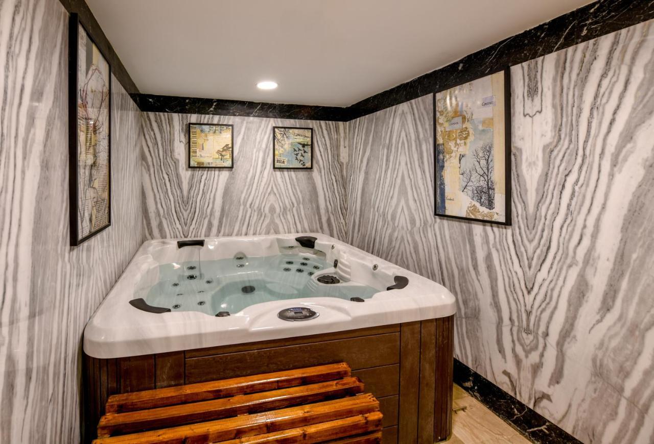Tolip Gardens Hotel Le Caire Extérieur photo A hot tub